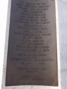 Plaque in front of the monument. 